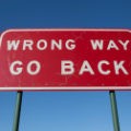 stock-photo-21439209-wrong-way-go-back-sign